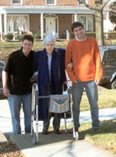 Gabe and Brad help Ginny into the house.